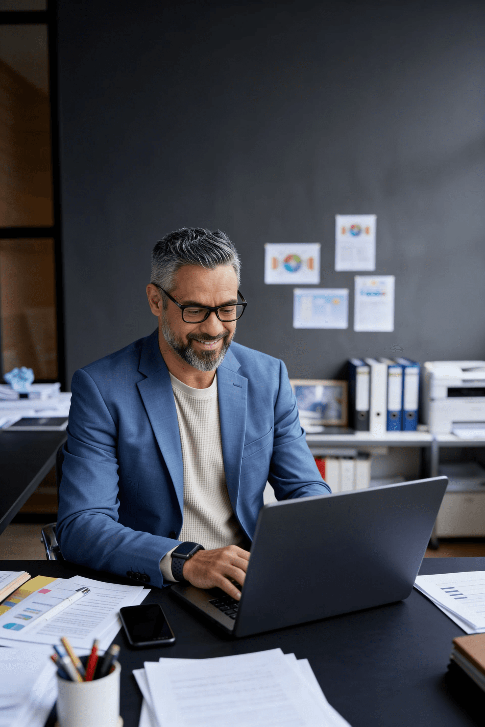 Operator reviewing analytics on a laptop